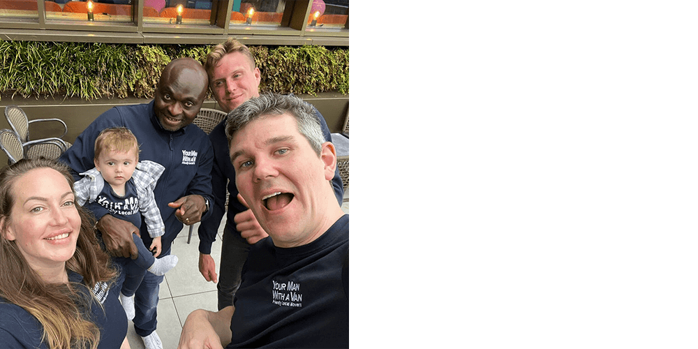 The Your Man With A Van Team wearing uniform T-shirts, with baby Ralph wearing a matching one.