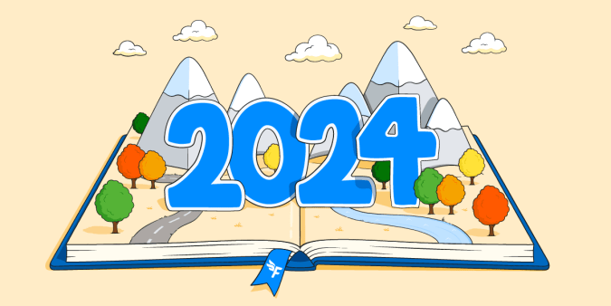 open pop-up book with mountains and autumnal trees opens up to a 2024 sign